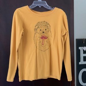 Hanna Andersson skirt and long sleeve set with hedgehog holding a red mushroom